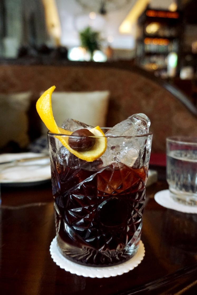 Csaba at The Gunawarman's Shepherd Negroni, consisting of Tanqueray, Mancino Rosso, house-made orange cherry and bitters. 